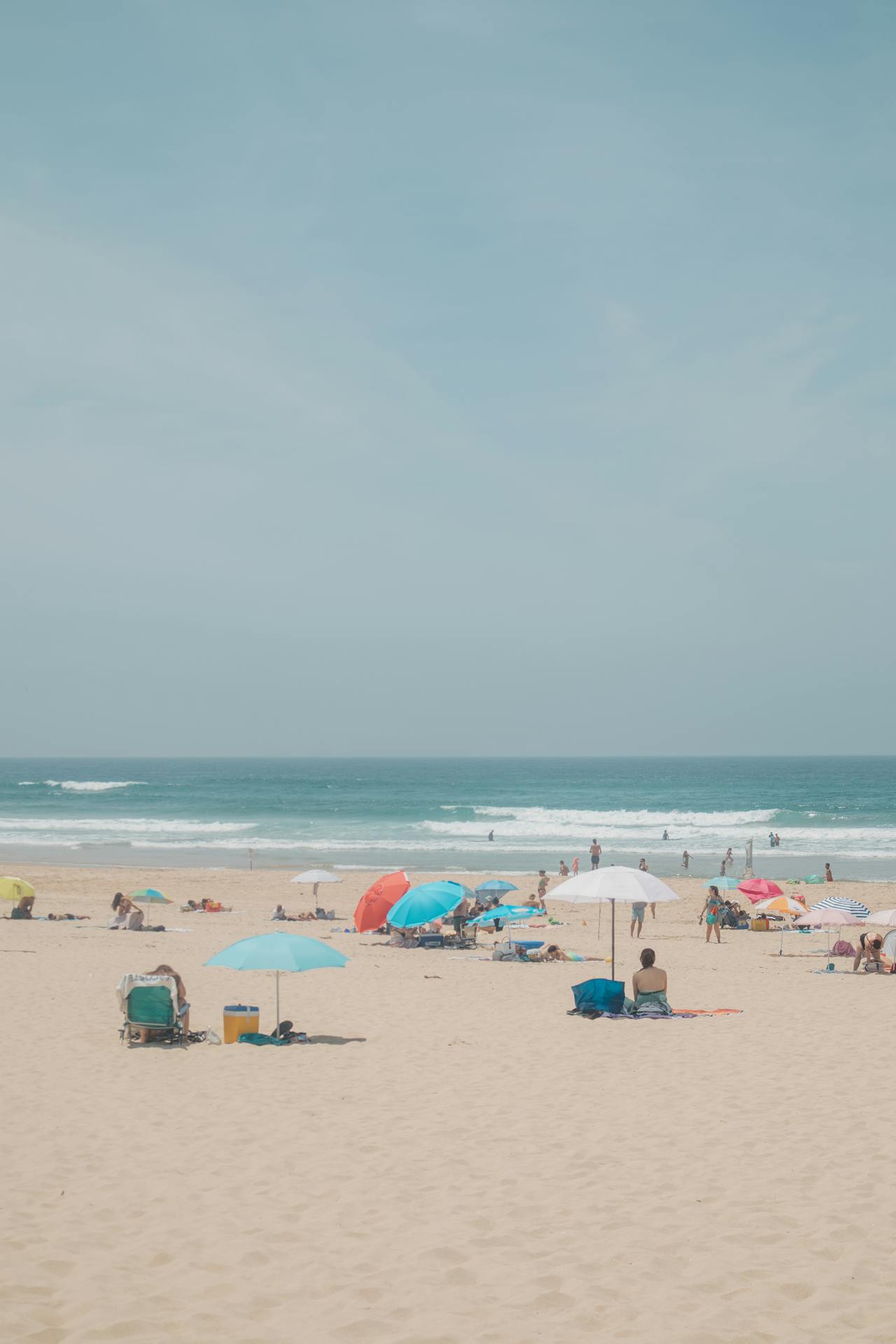 vacation beachgoers enjoying time with their families 